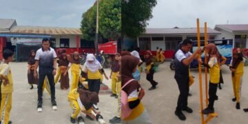 Pulihkan Trauma Banjir Anak SD Medan Marelan, Akademisi UNIMED Gelar Pojok Permainan Tradisional
